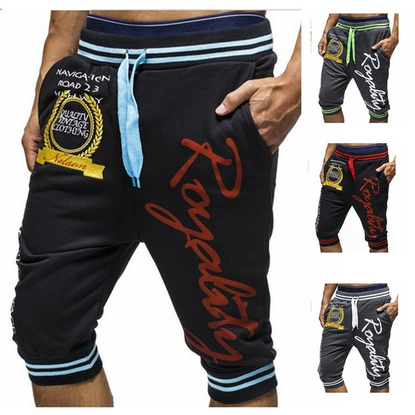 Meeste vabaaja püksid pikkusega 7/8 kirjadega