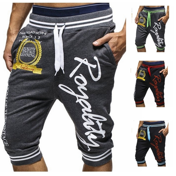 Meeste vabaaja püksid pikkusega 7/8 kirjadega