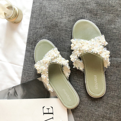 Modern női papucs lapos talppal és gyöngyökkel