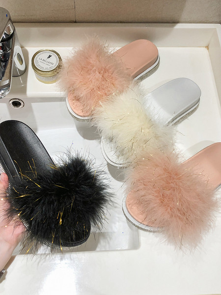 Aktuális női papucs lapos talppal és pehellyel