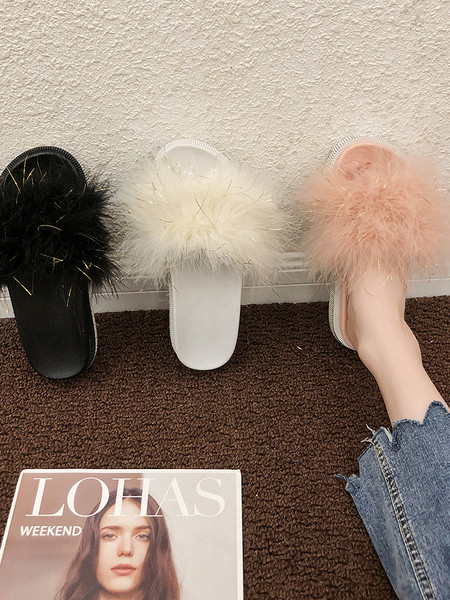 Aktuális női papucs lapos talppal és pehellyel