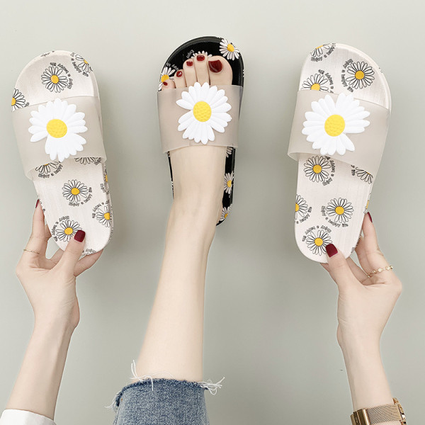 Alkalmi női papucs lapos talppal és virágos rátéttel