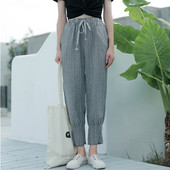 Ženske hlače s elastikom u struku - široki model u sivoj boji