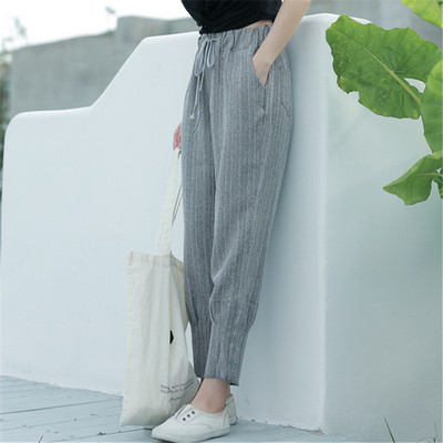 Ženske hlače s elastikom u struku - široki model u sivoj boji