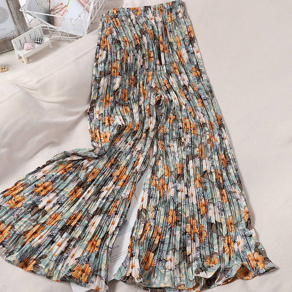 Ženske plisirane hlače s elastičnim strukom i cvjetnim uzorkom