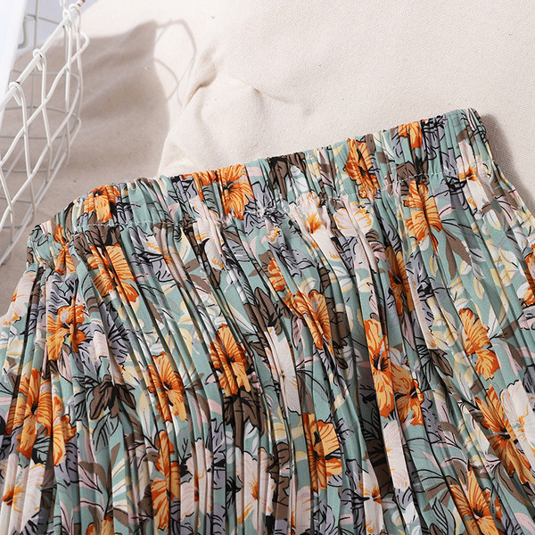 Ženske plisirane hlače s elastičnim strukom i cvjetnim uzorkom