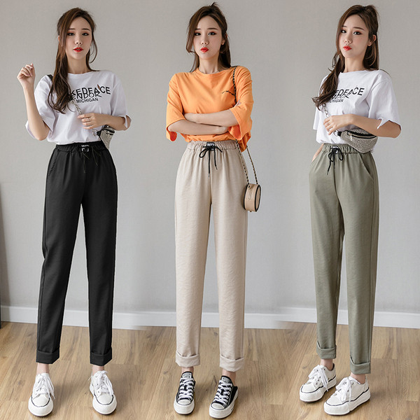 Ženske hlače s elastičnim strukom i vezicama - slobodan model