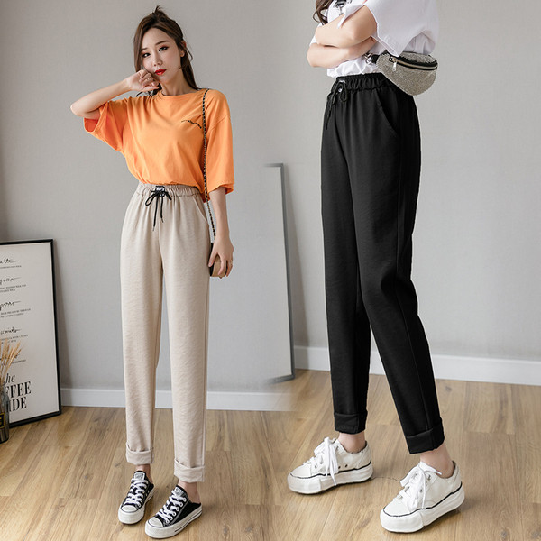 Ženske hlače s elastičnim strukom i vezicama - slobodan model