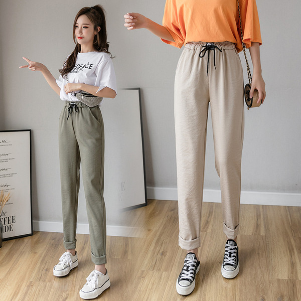 Ženske hlače s elastičnim strukom i vezicama - slobodan model