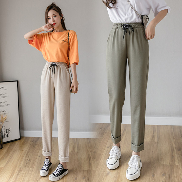 Ženske hlače s elastičnim strukom i vezicama - slobodan model