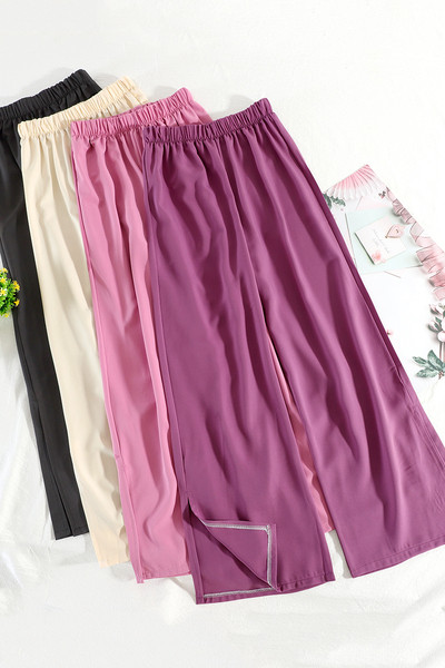 Широки дамски панталони с висока талия и цепка 