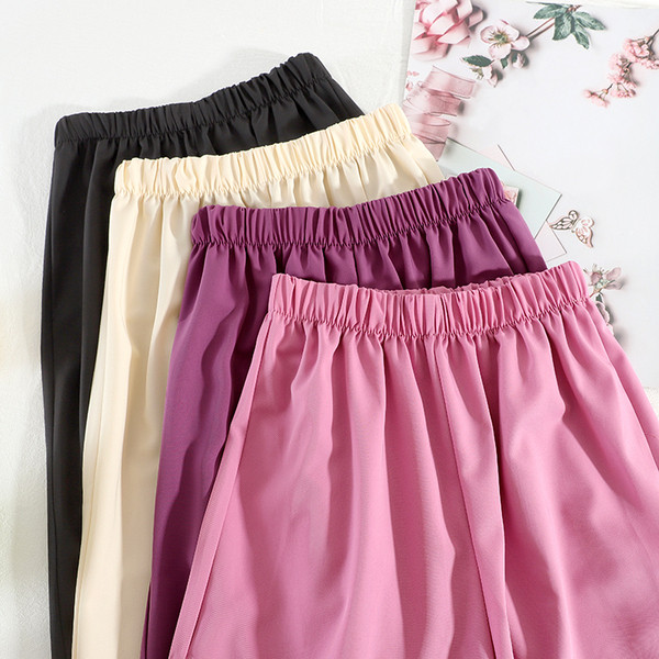 Широки дамски панталони с висока талия и цепка 