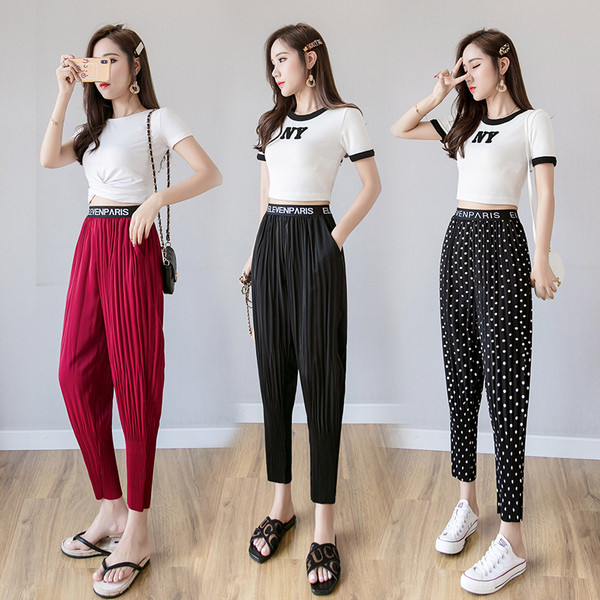 Plisirane ženske široke hlače s elastičnim strukom