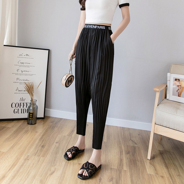 Plisirane ženske široke hlače s elastičnim strukom