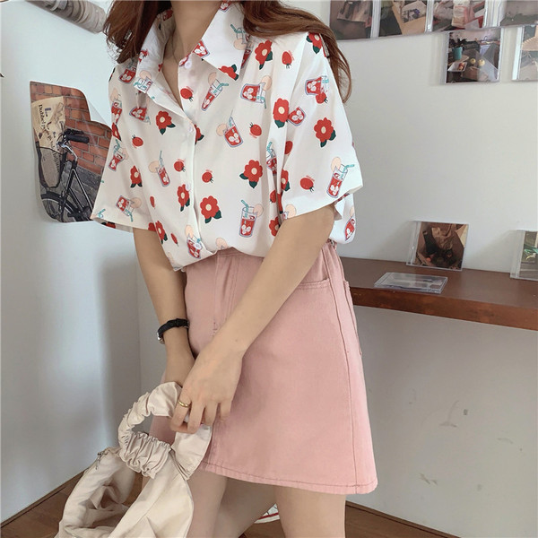 Ležerna ženska košulja širokog modela kratkih rukava