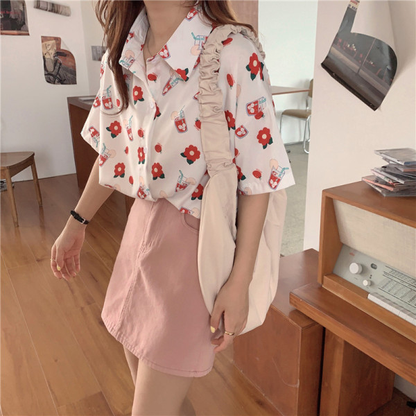 Ležerna ženska košulja širokog modela kratkih rukava