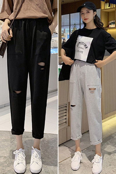 Ležerne ženske široke hlače s poderanim motivima