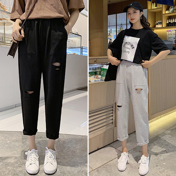 Ležerne ženske široke hlače s poderanim motivima