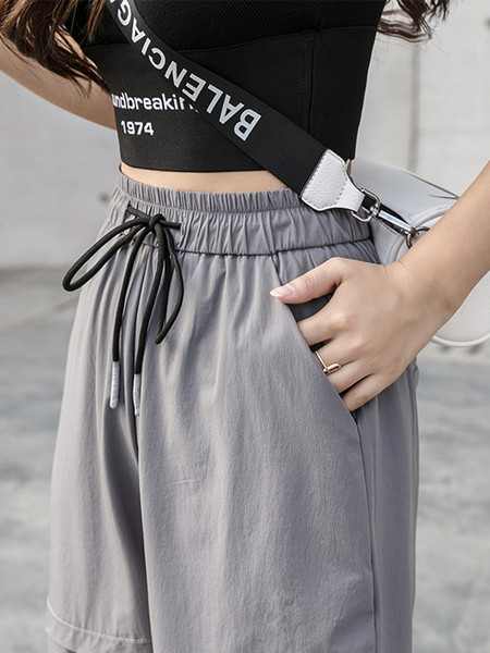 Moderne ženske hlače s vezicama