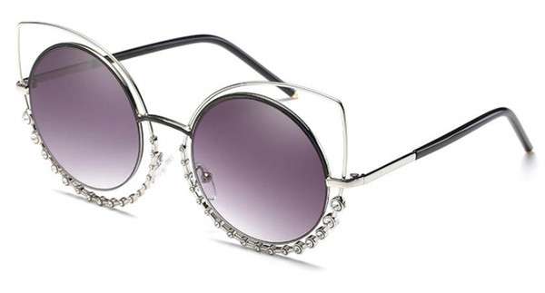 Elegantne ženske naočale okruglog oblika s ukrasnim kamenčićima