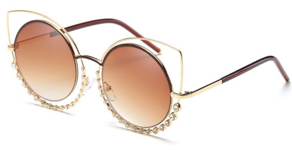 Elegantne ženske naočale okruglog oblika s ukrasnim kamenčićima