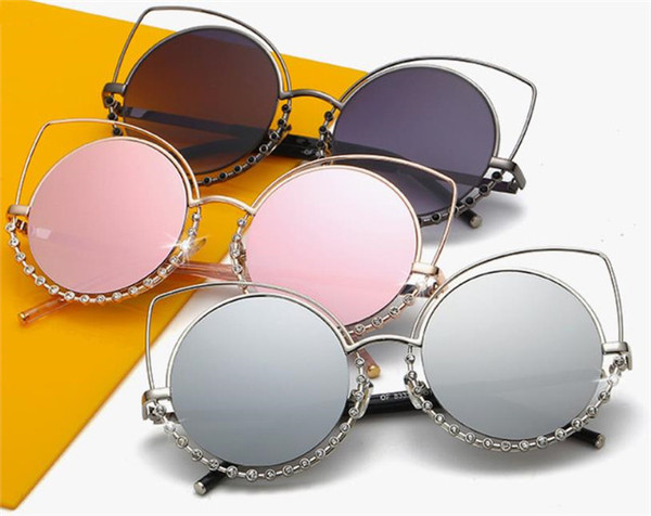 Elegantne ženske naočale okruglog oblika s ukrasnim kamenčićima