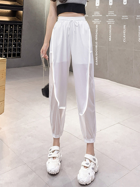 Modern női átlátszó nadrág fényvisszaverő csíkokkal