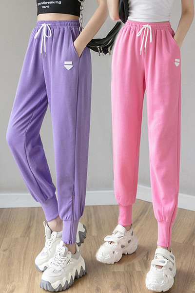 Alkalmi női nadrág rátéttel és nyakkendővel