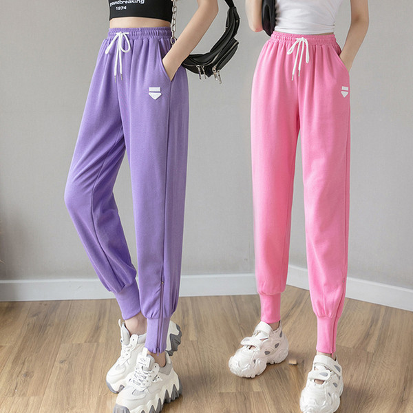 Alkalmi női nadrág rátéttel és nyakkendővel