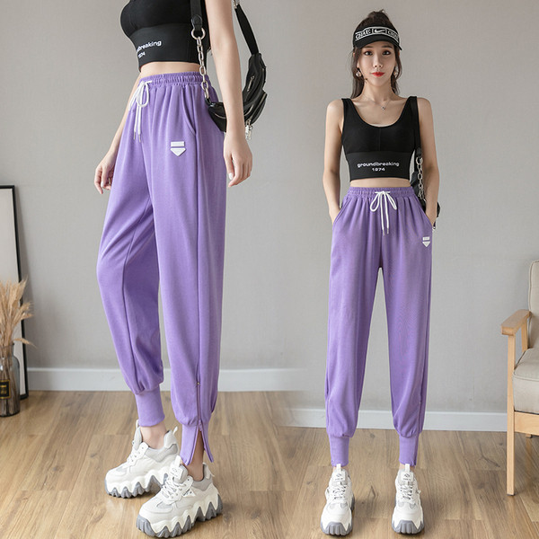 Alkalmi női nadrág rátéttel és nyakkendővel