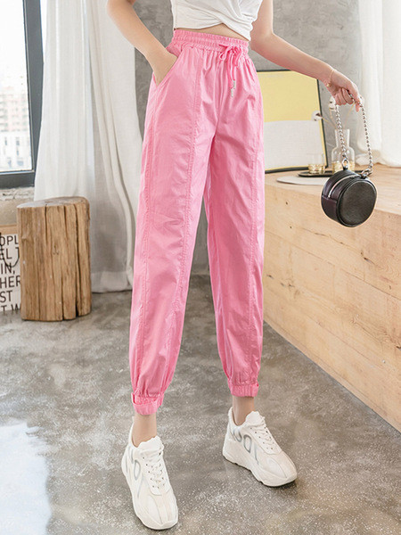 Női alkalmi nadrág magas derékkal és megkötővel