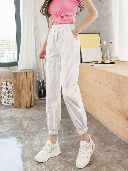 Női alkalmi nadrág magas derékkal és megkötővel