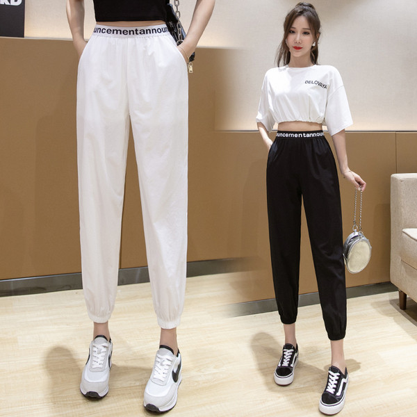 Ikdienas sieviešu bikses ar augstu elastīgu jostasvietu ar uzrakstu