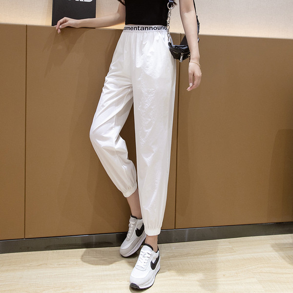 Ikdienas sieviešu bikses ar augstu elastīgu jostasvietu ar uzrakstu