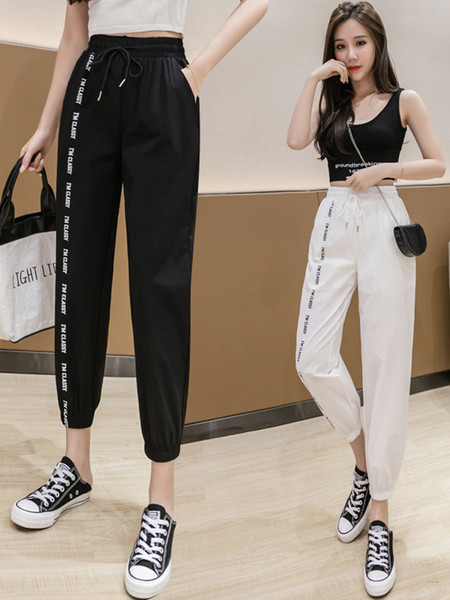 Sieviešu ikdienas bikses ar uzrakstu