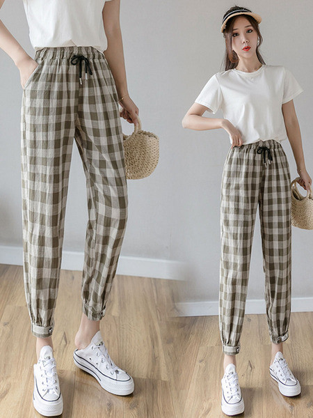 Kõrge vöökoha ja lipsudega ruudulised naistepüksid