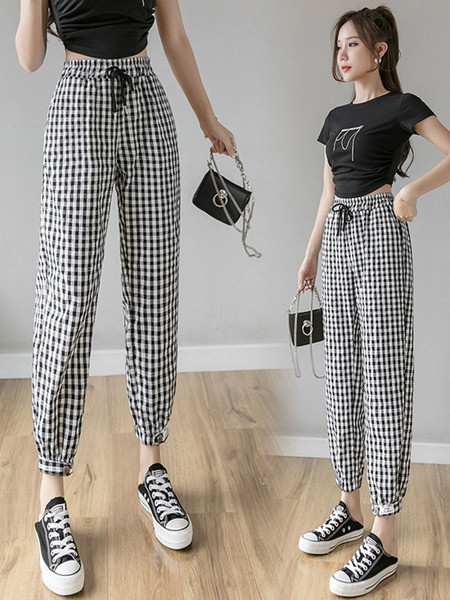 Kõrge vöökoha ja lipsudega ruudulised naistepüksid