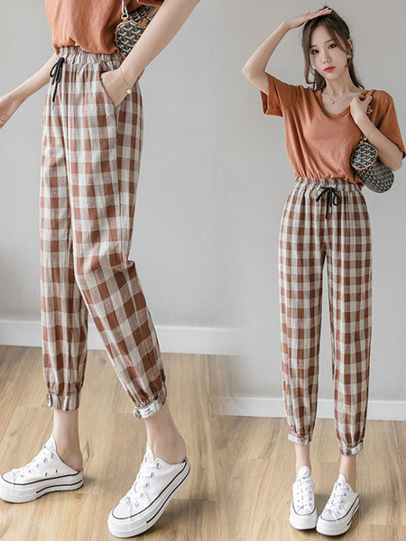 Kõrge vöökoha ja lipsudega ruudulised naistepüksid