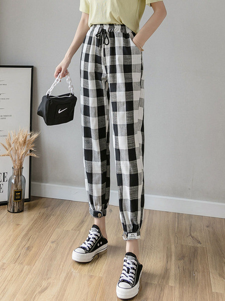 Kõrge vöökoha ja lipsudega ruudulised naistepüksid