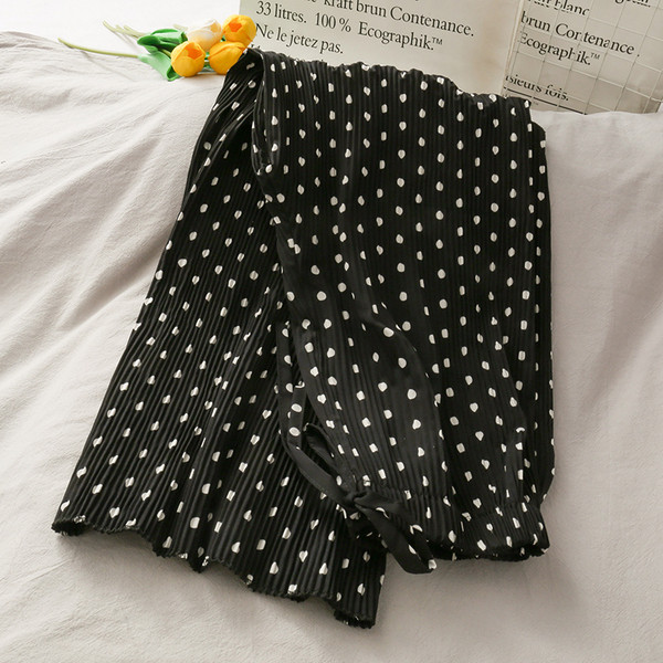 Plisirane ženske hlače s visokim strukom i printom