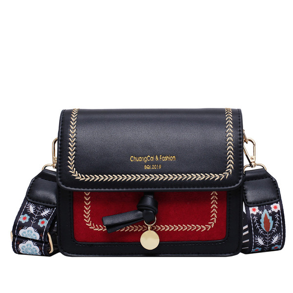 Modern női táska eco bőrből és színes széles fogantyúval