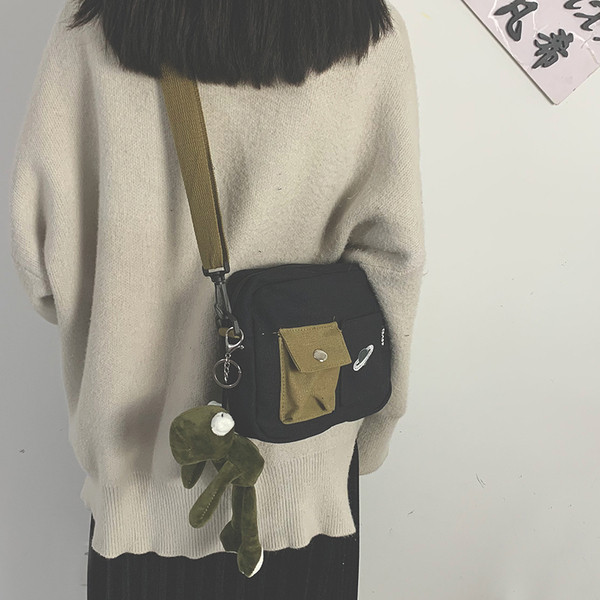 Mindennapi női szövettáska kis elülső zsebbel