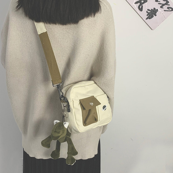 Mindennapi női szövettáska kis elülső zsebbel