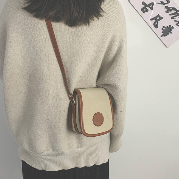 Sieviešu soma ar garu ādas rokturi