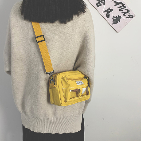 Ležerna ženska torba s prednjim prozirnim džepom