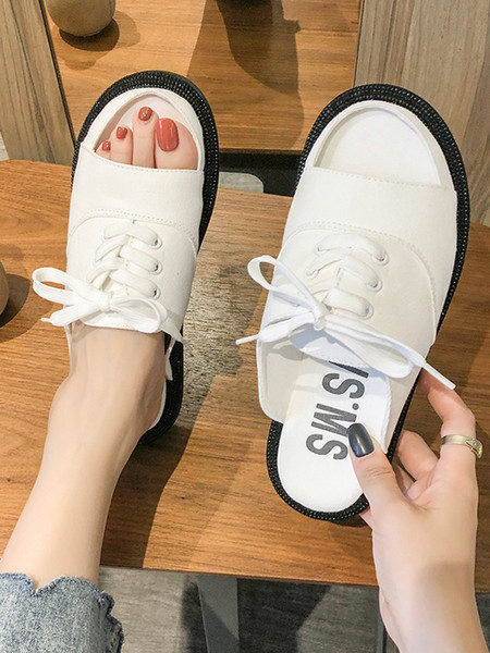 Sieviešu tekstila čības ar plakanu zoli un mežģīnēm