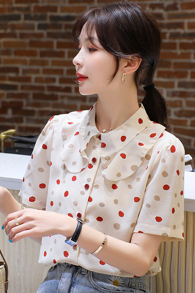 Moderns sieviešu punktveida krekls ar īsām piedurknēm un pogām