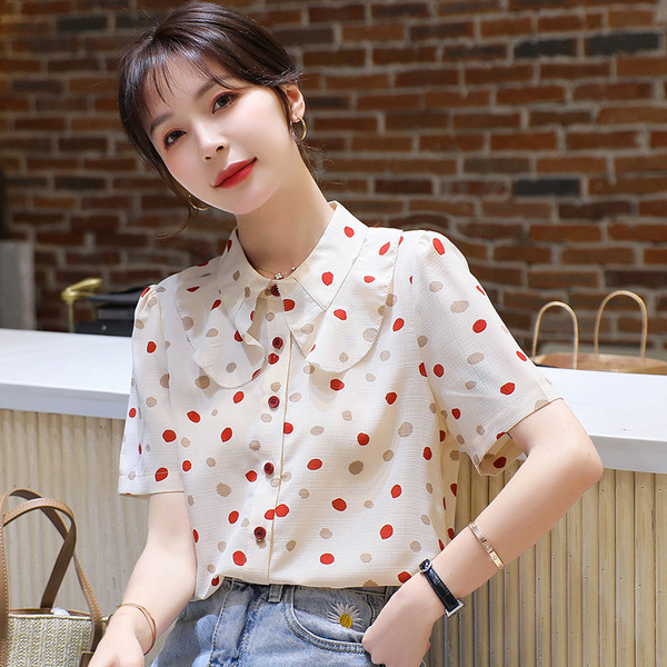 Moderns sieviešu punktveida krekls ar īsām piedurknēm un pogām