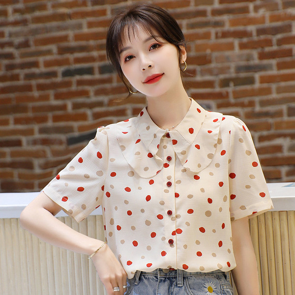 Moderns sieviešu punktveida krekls ar īsām piedurknēm un pogām