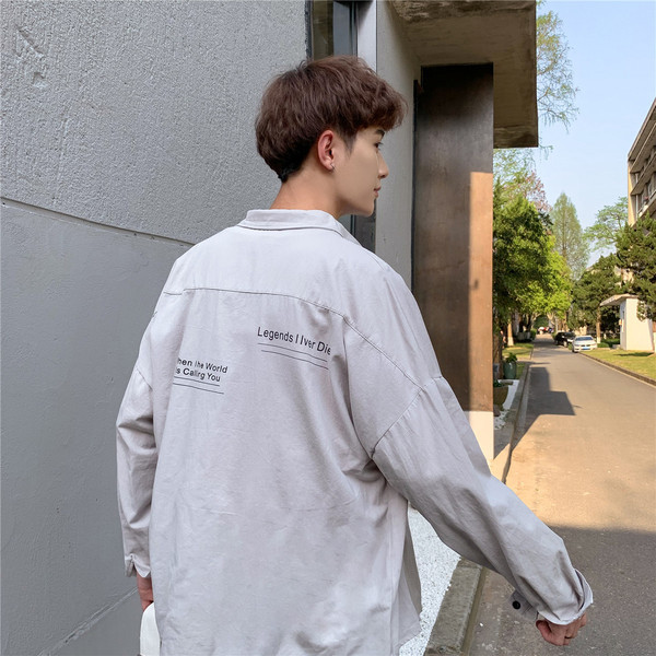 Lezser férfi ing széles modell hosszú ujjakkal és zsebekkel